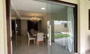 Imagem 2: Casa de condomínio para aluguel e venda possui 395 metros quadrados com 4 quartos