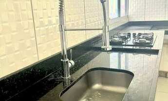 Imagem 5: Apartamento com dois quartos e fogão cooktop