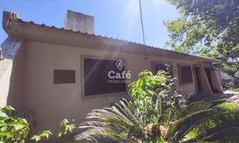 Imagem 5: Casa com 03 dormitórios 03 banheiros vaga de garagem e churrasqueira