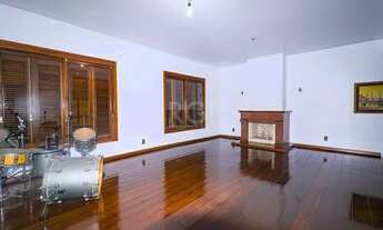 Imagem 3: Venda Padrão - Porto Alegre - Casa com 5 dormitórios, suíte, piscina, lareira, churrasqu