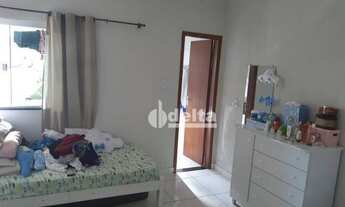 Imagem 2: Casa com 4 dormitórios à venda, 142 m² por R$ 350.000,00 - Jardim das Palmeiras - Uberlând