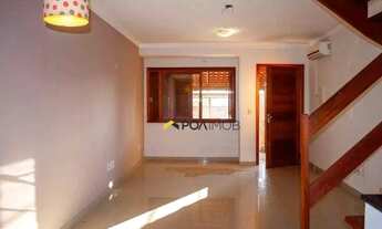 Imagem 2: Casa com 3 dormitórios para alugar, 170 m² por R$ 4.181,00/mês - Guarujá - Porto Alegre/RS