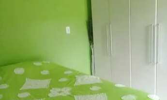 Imagem 2: A casa tem 1quarto, sala, ,cozinha e banheiro, com mais 1 banheiro na varanda