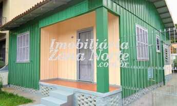 Imagem 3: Casa de madeira com aprox. 100m², 2 dormitorios, salas de estar e jantar, cozinha, área s