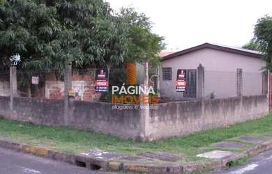 Imagem 3: Página 1 Imóveis anuncia Terreno de esquina com casa de 3 dormitórios, para venda no bairr