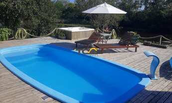 Imagem: Lindo Sítio a beira rio, a 15 minutos do