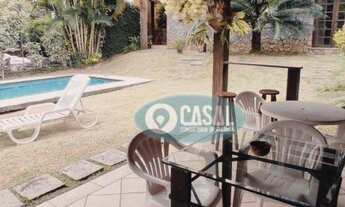 Imagem 4: Casa em Condomínio com 04 Quartos, Piscina, Churrasqueira, Sauna e Belo Quintal!