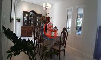 Imagem 6: Casa térrea com amplo quintal área gourmet e suíte com hidro em condomínio de alto padrão