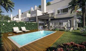 Imagem 2: Caminho Imóveis vende casa de quatro dormitórios, em condomínio, com acesso direto ao Guaí