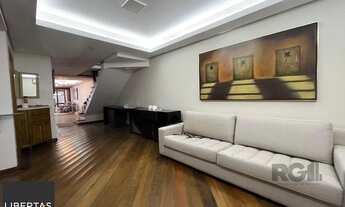 Imagem 4: Casa de três quartos, suíte e quatro vagas de garagem no bairro Menino Deus em Porto Alegr