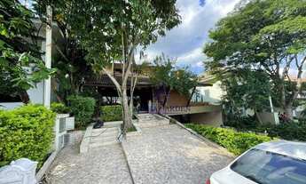 Imagem 2: Sobrado com 3 dormitórios para alugar, 404 m² por R$ 7.500,00/mês - Alphaville 06 - Santan