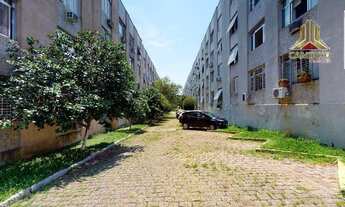 Imagem 6: Na Rua Eurico Lara em Porto Alegre, vendo apartamento de dois dormitórios com garagem