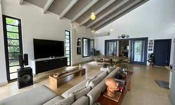 Imagem 4: Casa térrea com 03 suítes e home reversível com área de lazer grande e vista de cinema