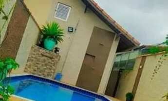 Imagem 2: Casa com piscina e apartamentos na Praia Grande