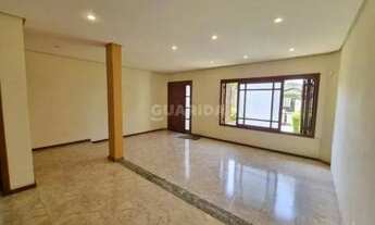 Imagem 2: Casa em Condomínio com 4 dormitórios, sendo 1 suíte, e 2 vagas de garagem no bairro Camaqu