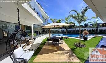 Imagem 2: Casa de condomínio para venda tem 650 metros quadrados com 6 quartos em Riviera - Bertioga