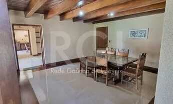 Imagem 6: Casa com cinco (5) dormitórios, quatro (4) suítes e 10 vagas no bairro Vila Assunção, Port