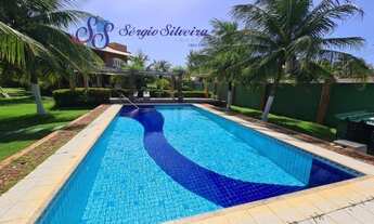 Imagem 2: Casa no Porto das Dunas perto da praia com 5 suítes amplo terreno