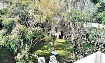 Imagem 3: Casa de condomínio térrea para venda tem 300 metros quadrados com 4 quartos