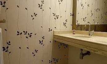 Imagem 2: Apartamento com 4 suítes, sala de estar com lareira, 4 vagas de garagem, próximo ao Parque