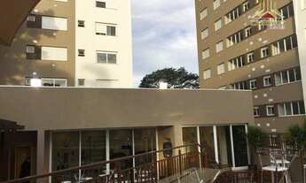 Imagem 2: No Sy Condomínio Praça, vendo apartamento de dois dormitórios, suíte, com piso, móveis fix