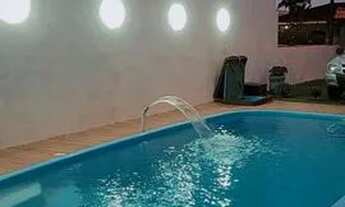 Imagem 4: Casa na praia com piscina