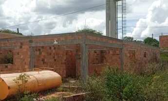 Imagem 2: Terreno com construção em ponto de Laje