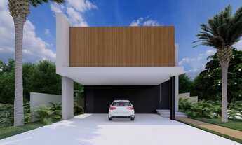 Imagem 2: Casa para venda tem 325 metros quadrados com 4 suítes no bairro SIM