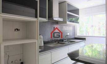 Imagem 2: Apartamento com 2 dormitórios à venda, 70 m² por R$ 330.000,00 - Vila Homero Thon - Santo