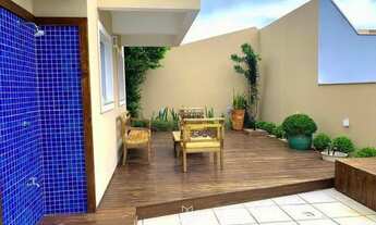 Imagem 5: Casa com pé direito duplo, lareira e piscina em condomínio fechado