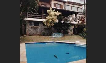 Imagem 2: Casa em Condomínio com 04 Quartos, Piscina, Churrasqueira, Sauna e Belo Quintal!