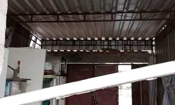 Imagem 6: Terreno com Garagem coberta e portão carro e social