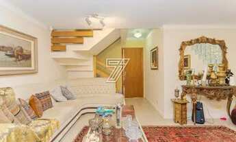 Imagem 3: Sobrado a venda possui 261 metros quadrados com 5 quartos em Água Verde - Curitiba - PR