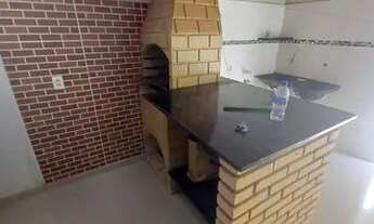 Imagem 2: Casa com três dormitórios e salão