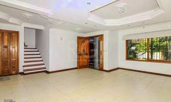 Imagem 2: Casa 3 dormitórios, 1 suíte com hidro e closet, 3 banheiros, 2 vagas no bairro Ipanema, 24