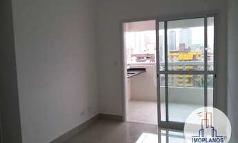 Imagem 2: Apartamento com 2 dormitórios à venda, 58 m² por R$ 450.000,00 - Canto do Forte - Praia Gr