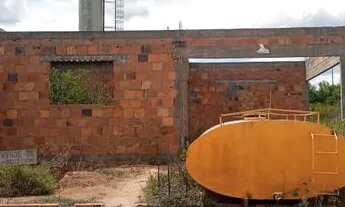 Imagem 3: Terreno com construção em ponto de Laje