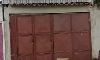 Imagem 2: Terreno com Garagem coberta e portão carro e social