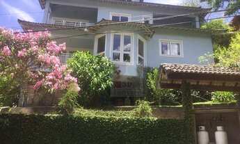 Imagem 2: Casa com 4 quartos 3 suítes, suíte master com hidromassagem e closet, 4 vagas de garagem