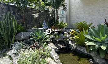 Imagem 4: Luxuosa Casa Triplex com 4 Suítes, Piscina e Área Gourmet em Condomínio Fechado