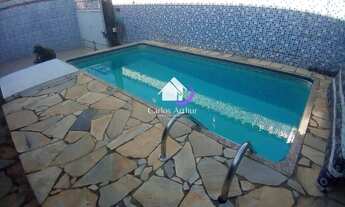 Imagem 4: Sobrado para venda possui 240 metros quadrados com 7 quartos em Tupy - Itanhaém - SP