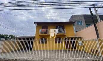 Imagem 2: Sobrado com 4 dormitórios à venda, 170 m² por R$ 650.000,00 - Uberaba - Curitiba/PR