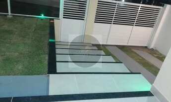 Imagem 7: Casa com amplo quintal, 03 quartos, área gourmet, garagem coberta. Condomínio fechado