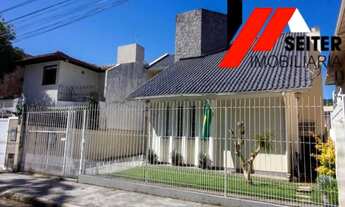 Imagem 1: Casa de 4 dormitórios a venda em área mista Santa Monica Florianópolis