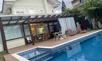 Imagem 1: Casa com 4 dormitórios para alugar, 258 m² por R$ 4.500,00/dia - Jurerê Internacional - Fl