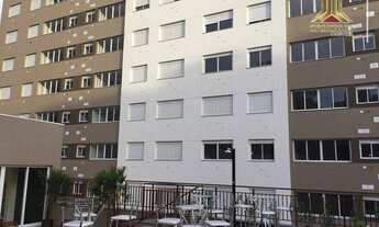 Imagem 7: No Sy Condomínio Praça, vendo apartamento de dois dormitórios, suíte, com piso, móveis fix