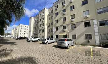 Imagem 2: Apartamento térreo de dois dormitórios e duas vagas na garagem no edifício Porto Guaíba