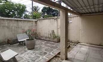 Imagem 6: Vendo casa em Jardim São Paulo uma rua muito boa e calçada, com Jardim e Quintal e com um