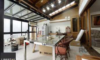 Imagem 7: Casa de três quartos, suíte e quatro vagas de garagem no bairro Menino Deus em Porto Alegr