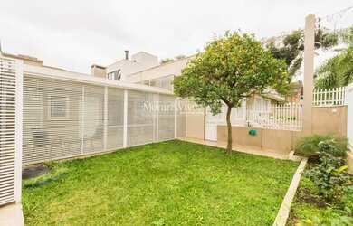 Imagem 3: Casa para Venda em Curitiba, Água Verde, 3 dormitórios, 1 suíte, 3 banheiros, 3 vagas